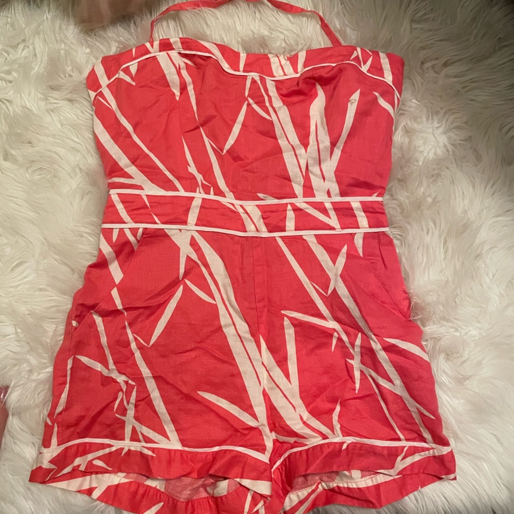 Romper once piece zipper back new with out tags coral Halter.